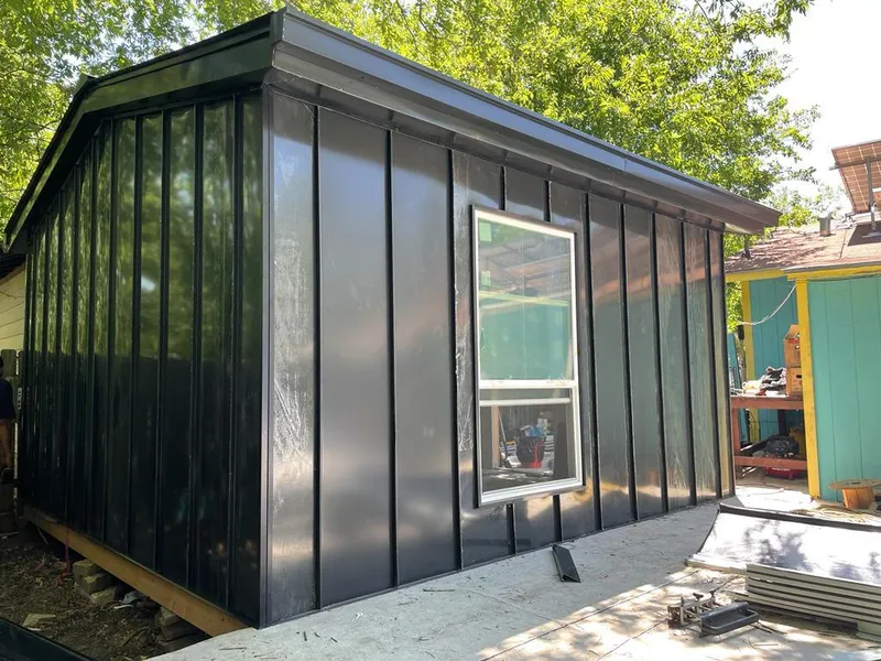 Black standing seam metal wall panels for Metal Roof Installation in Mack