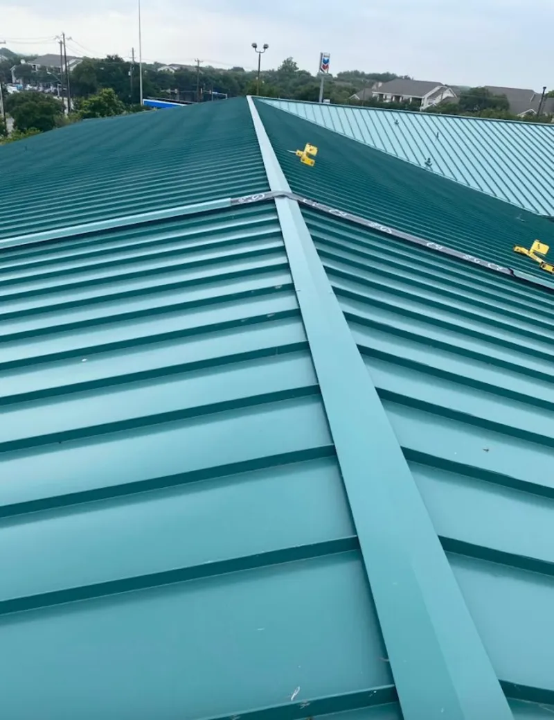 Green commercial metal roof ridge and valley for Metal Roof Repair in Mack
